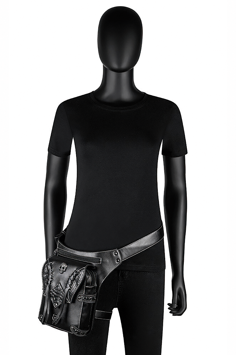 Black multifuncional leather skull bag worn by mannequin, showcasing gothic punk style and unique design.