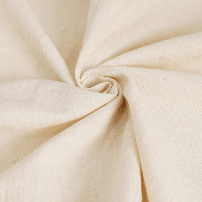 Soft beige cotton fabric, perfect for vintage clothing like men's stand collar shirts.