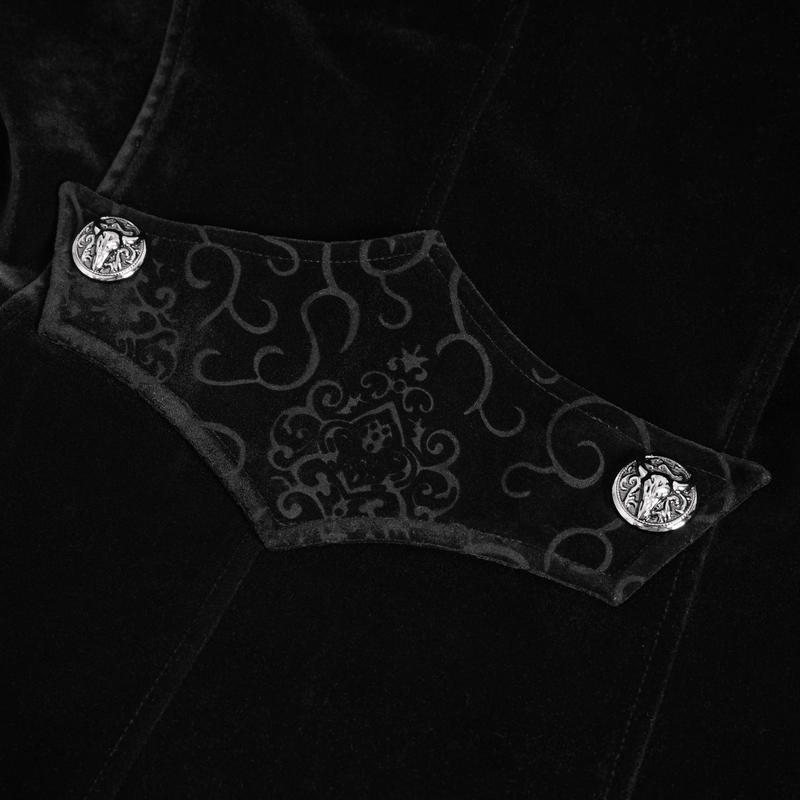 Close-up of vintage gothic coat with embroidered lace and unique silver buttons, showcasing elegant design detail.