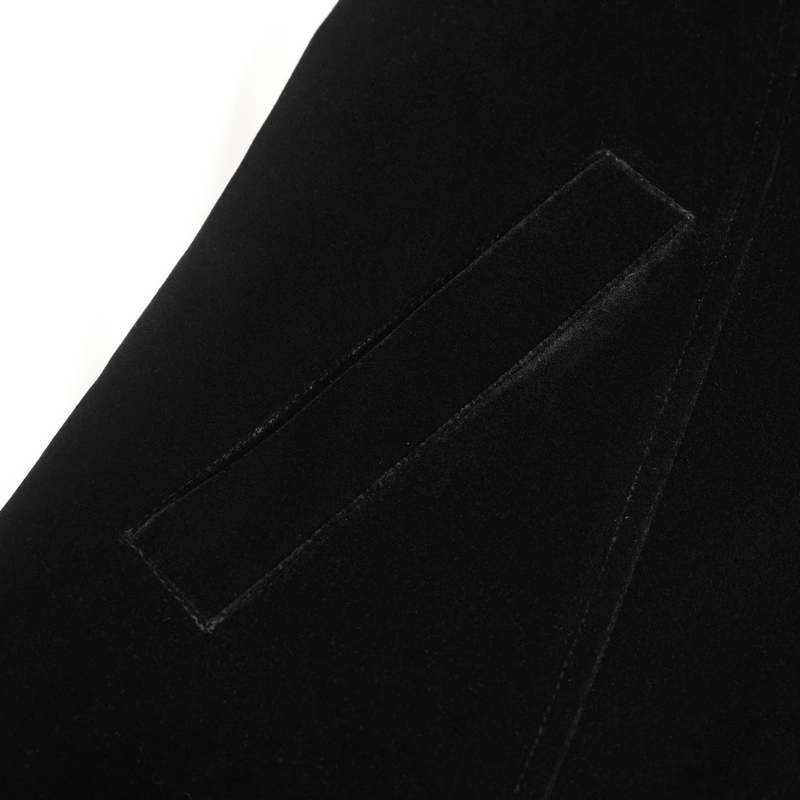 Close-up of the sleek pocket detail on a vintage stand collar men's coat in black fabric.
