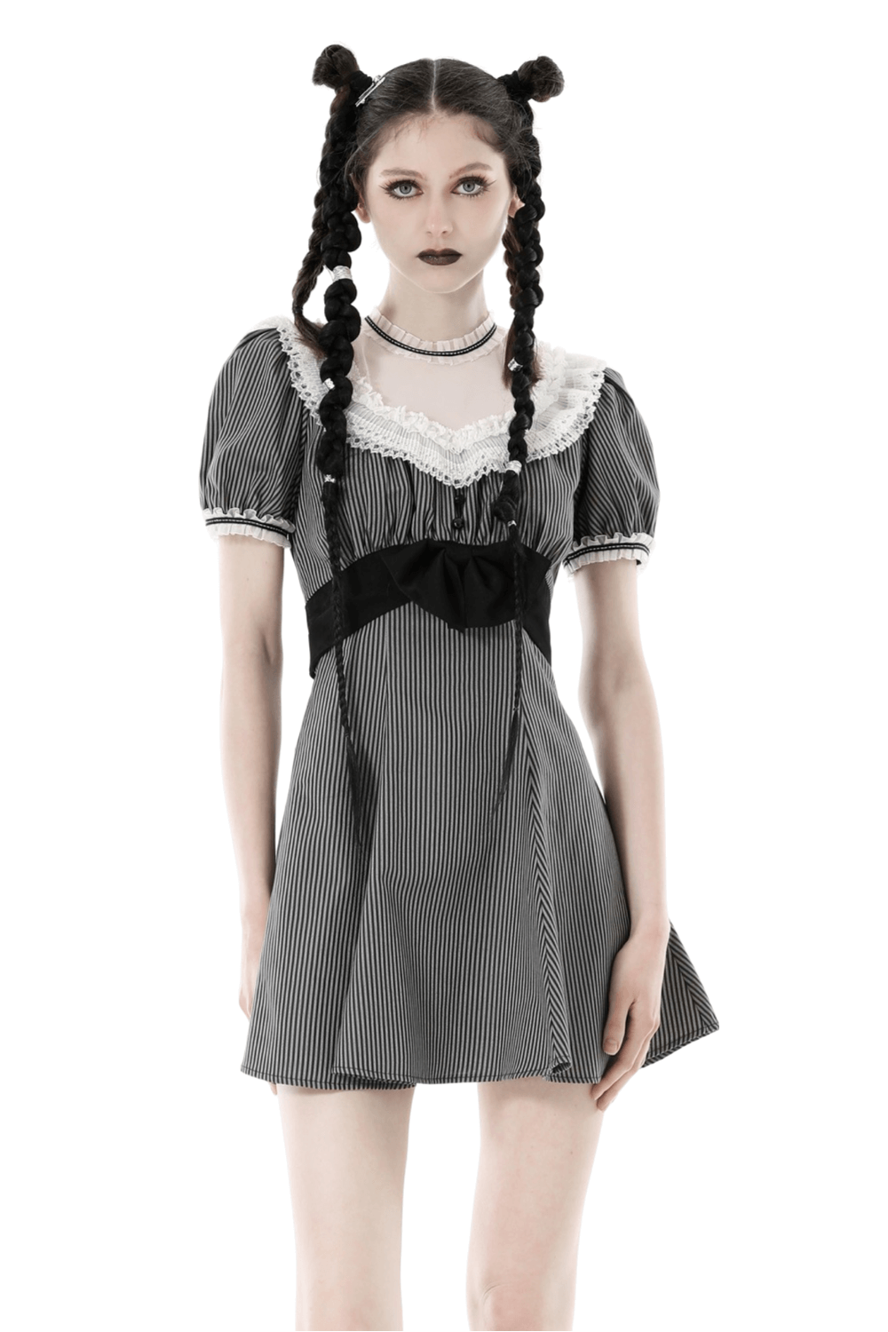 Vintage striped dress with lace collar and bow detail, showcasing a stylish silhouette.