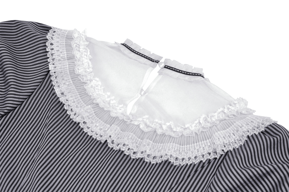 Close-up of vintage striped dress lace collar and bow detail, showcasing elegant fabric and feminine accents.