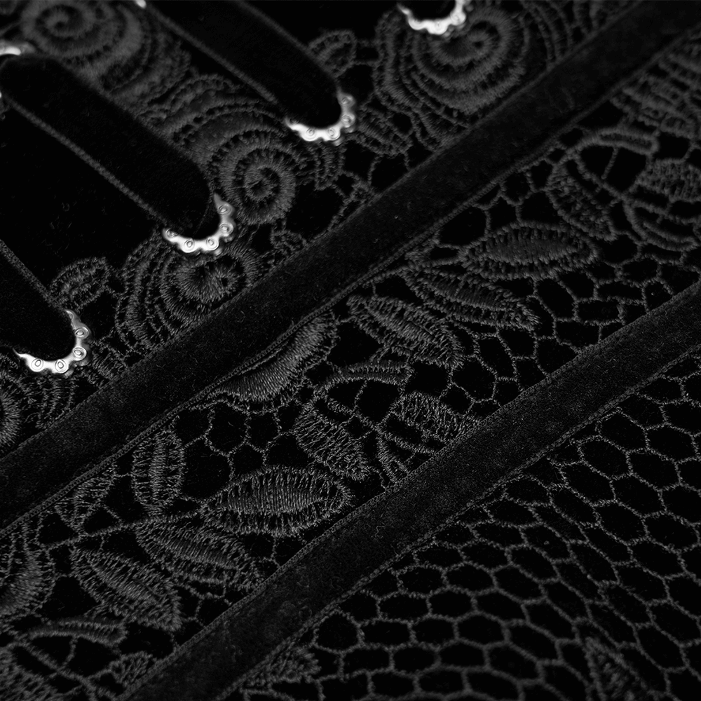 Close-up of vintage velvet cincher with rose lace detailing, showcasing elegant textures and design features.