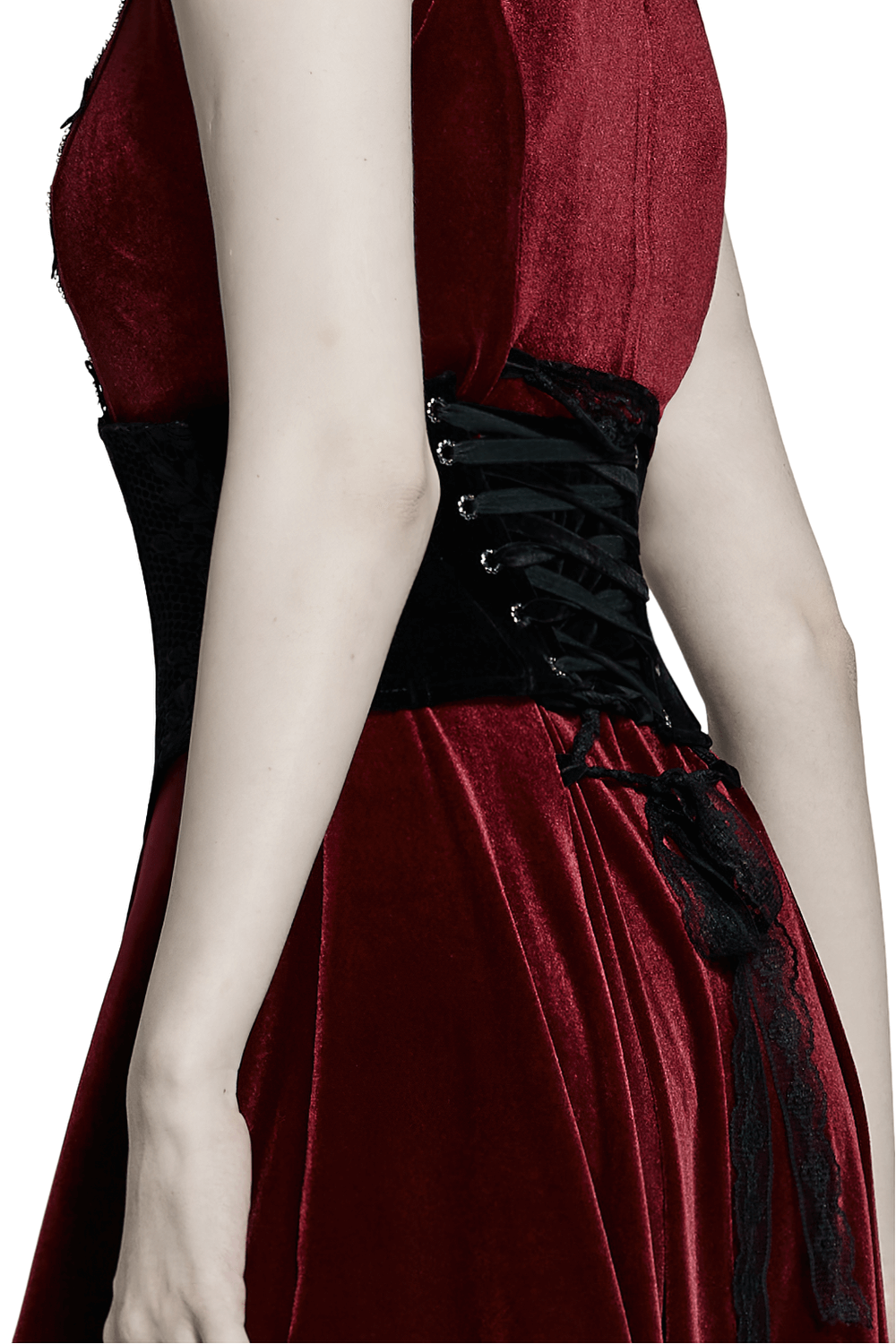 Vintage velvet cincher belt with lace-up back and zipper, showcased elegantly against a red velvet dress.