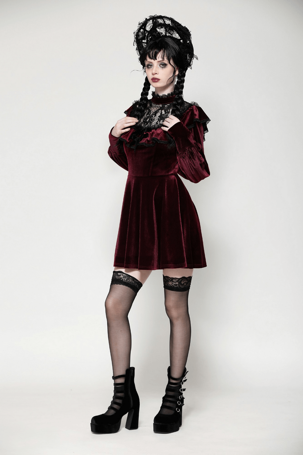 Gothic vintage velvet dress with black lace trim, burgundy fabric, ruffles, and puff sleeves, perfect for elegant occasions.