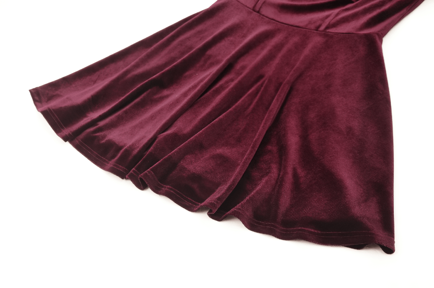 Burgundy velvet mini dress with elegant draping and vintage gothic charm.