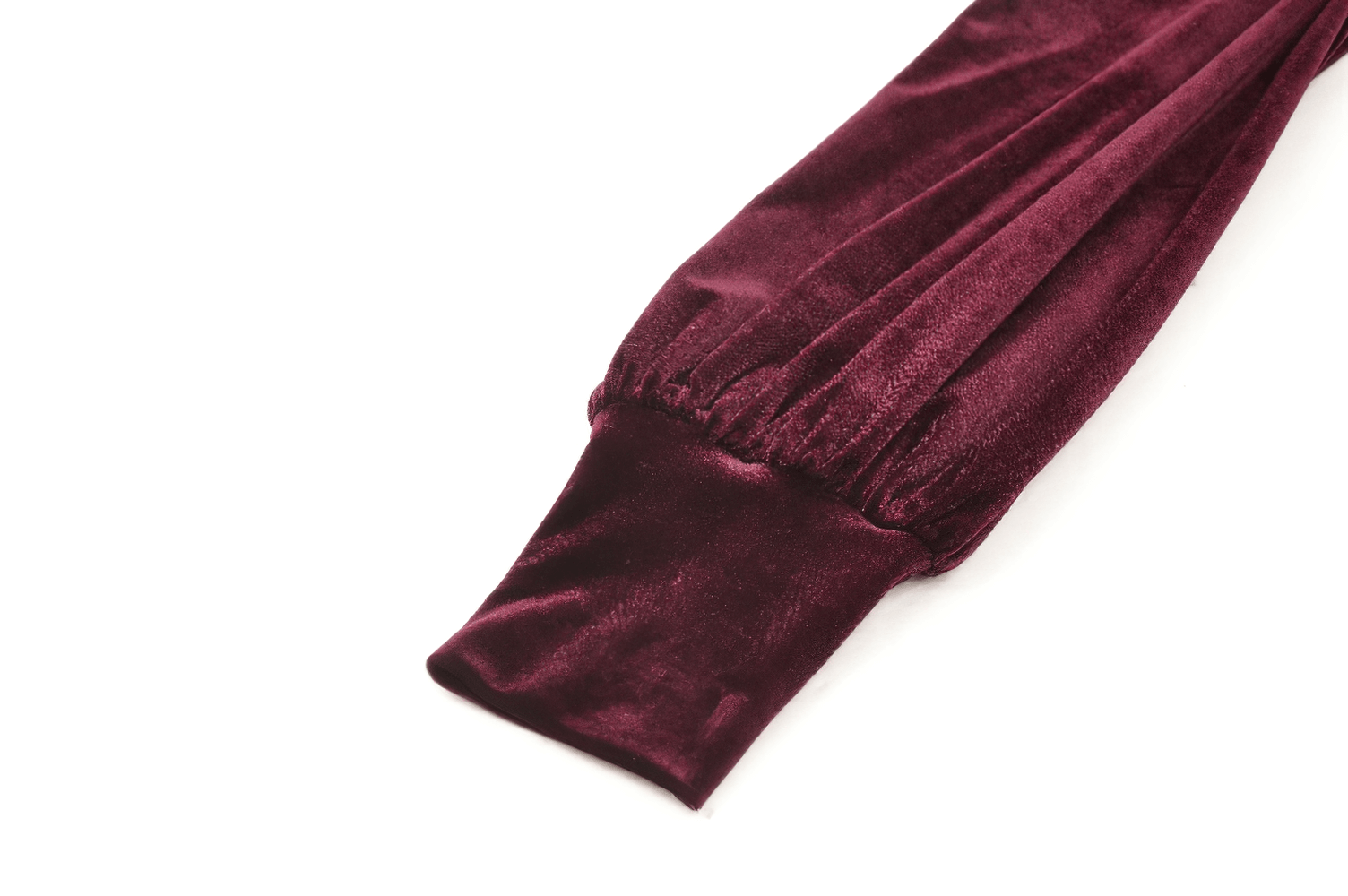 Burgundy velvet puff sleeve detail of gothic mini dress with ruffles and lace trim.