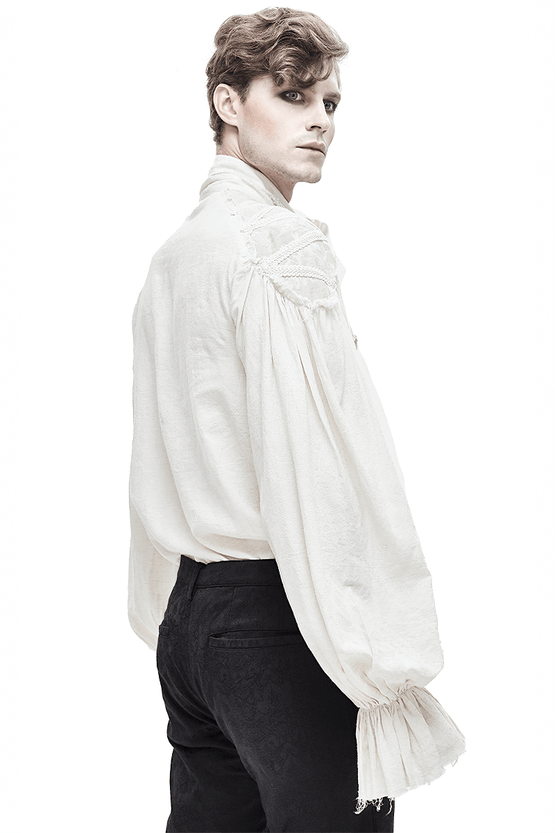 Vintage white long sleeve men's shirt with ruffles and flared cuffs, perfect for a gothic style look.