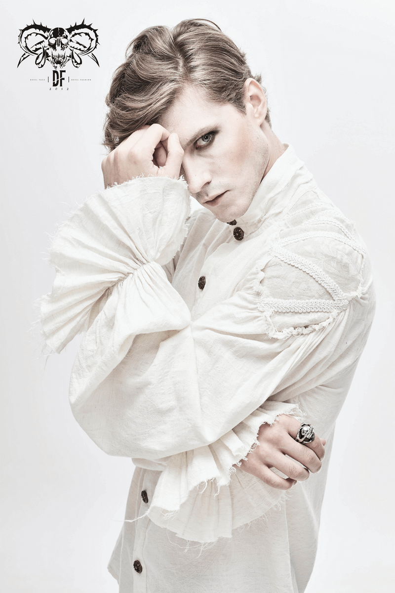 Men's vintage white Gothic shirt with flared cuffs and ruffles, showcasing a stylish retro look.