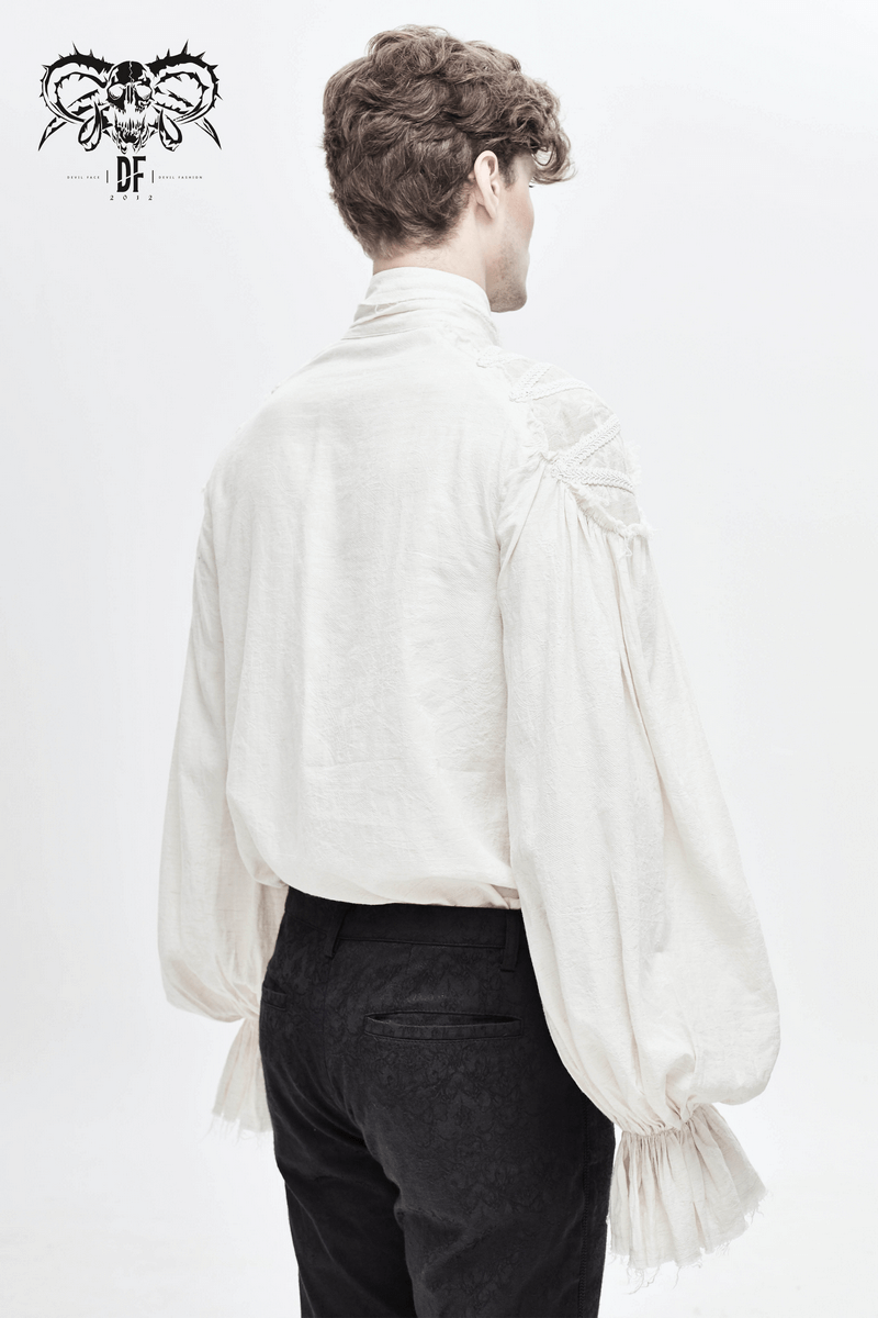 Back view of a vintage white men's shirt with flared cuffs and ruffles in gothic style.
