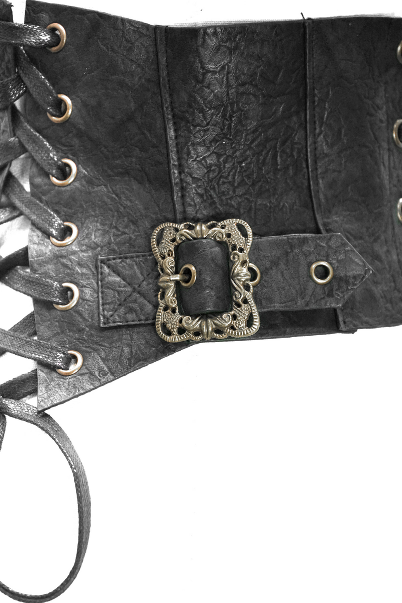 Vintage women's black synthetic leather corset with decorative laces and ornate buckle, perfect retro accessory.