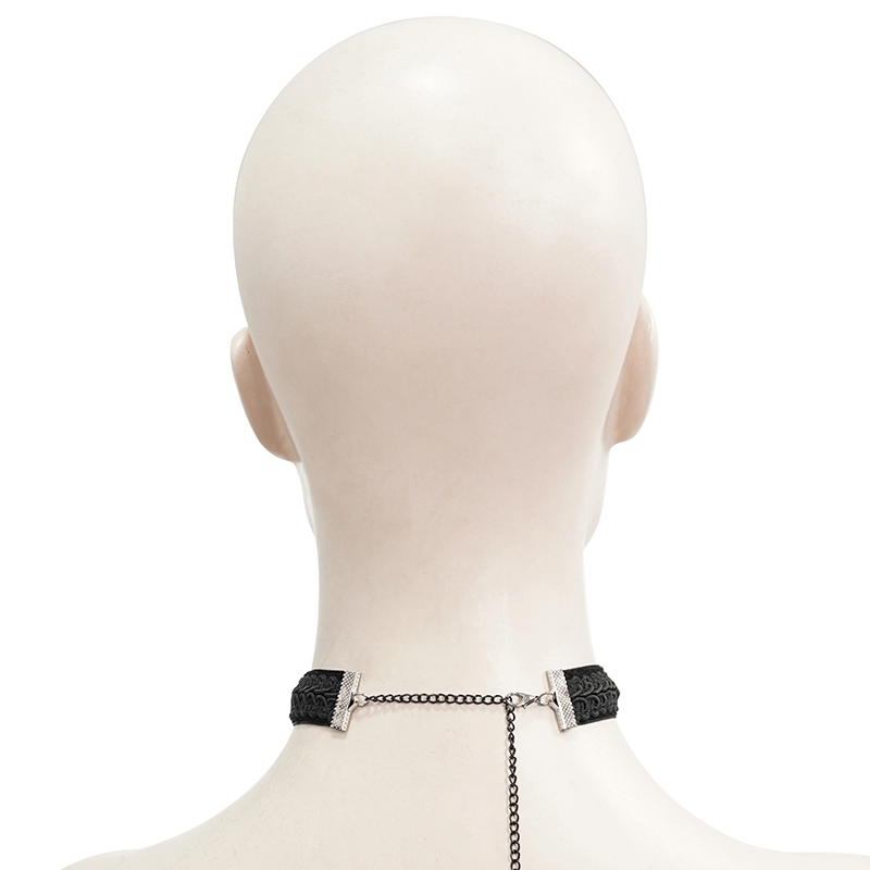 Back view of vintage women's choker with chains and red stones, showcasing gothic elegance and stylish design.