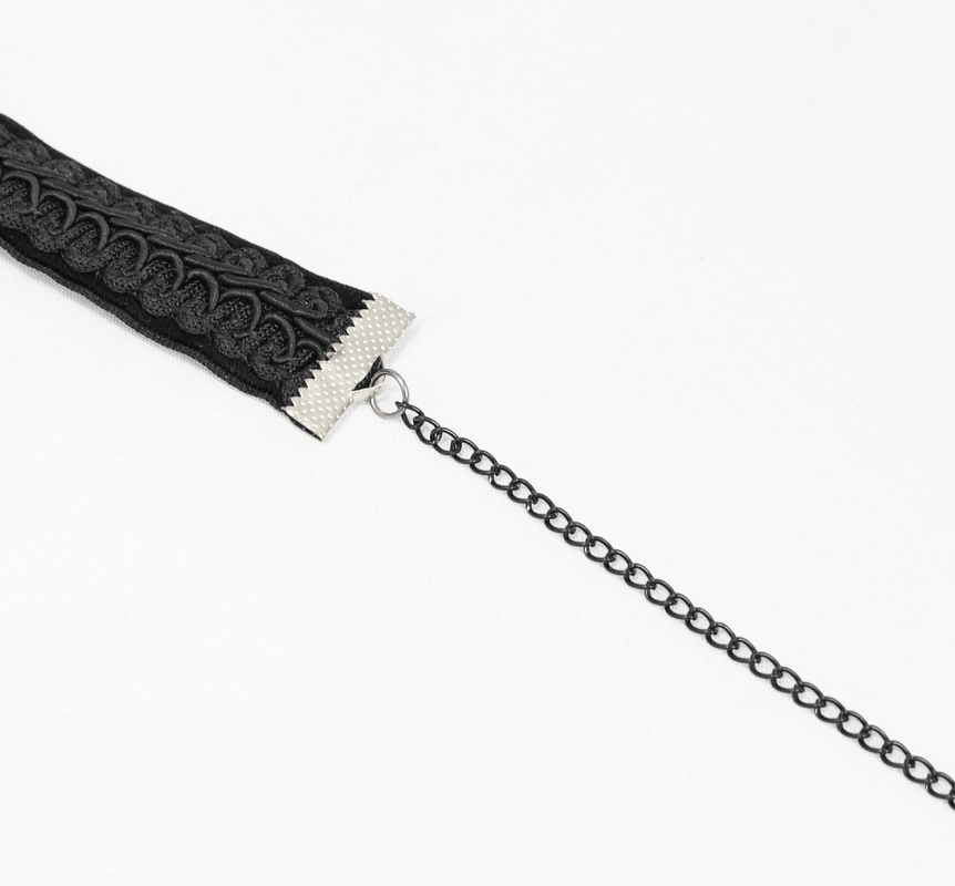 Elegant black gothic choker with intricate lace design and chain, perfect for vintage outfits.