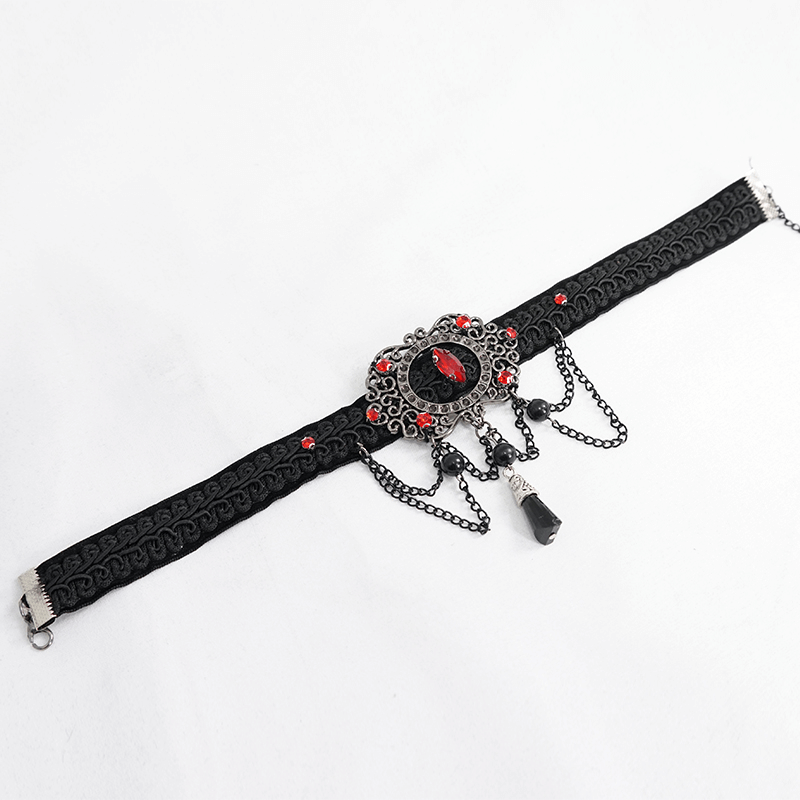 Vintage women's gothic choker with chains and blood-red stones, elegant accessory for retro outfits.
