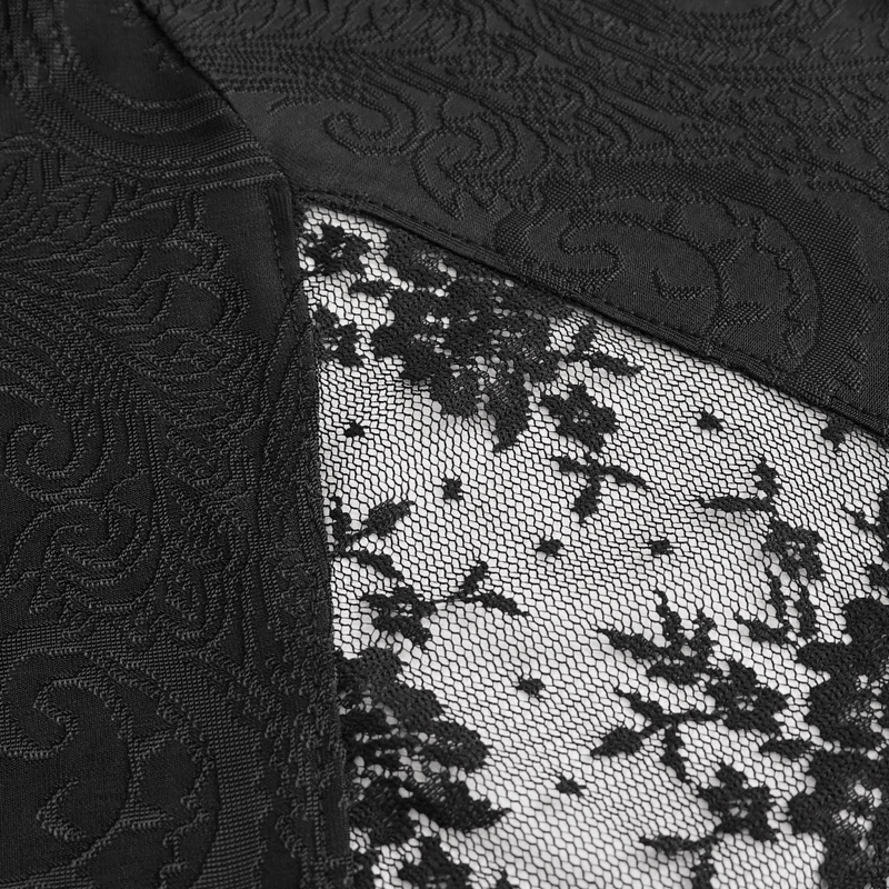 Close-up of black vintage lace fabric with intricate floral patterns and detailed texture for elegant dress design.
