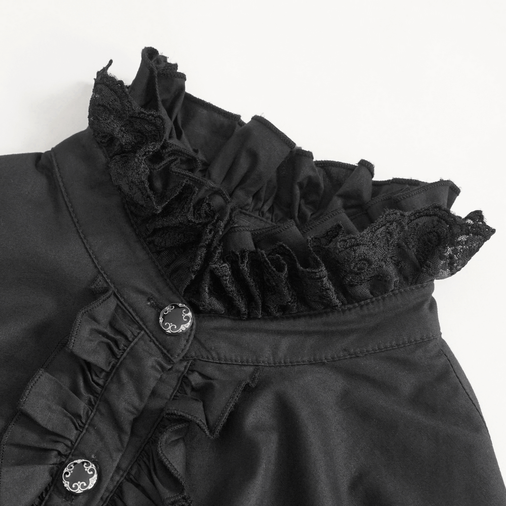 Close-up of a vintage women's black blouse with gothic lace ruffle collar and elegant button detailing.