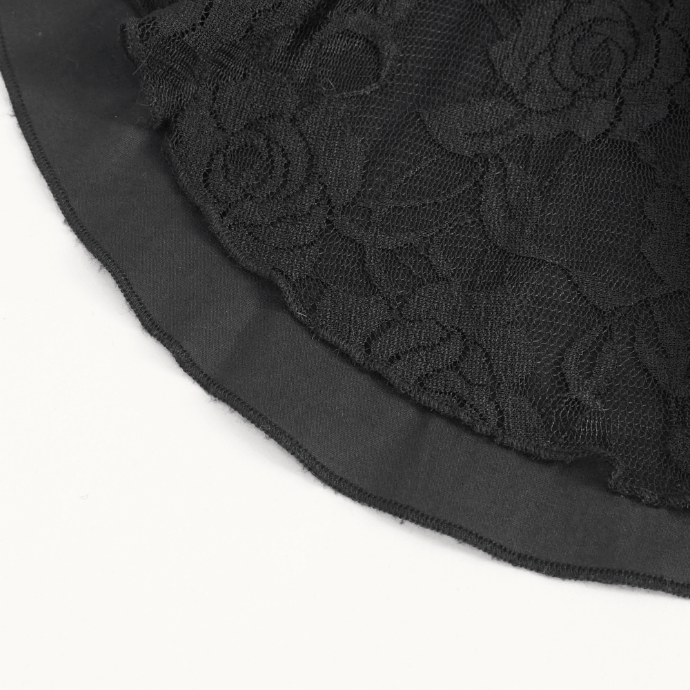 Close-up of exquisite black lace fabric with floral patterns, ideal for gothic style blouses and vintage fashion.