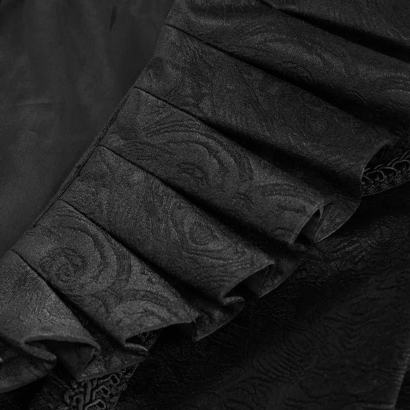 Close-up of black gothic jacket's ruffled collar showcasing intricate detailing and elegant fabric texture.