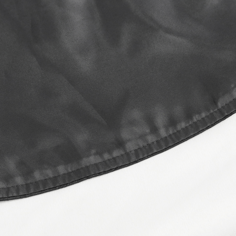 Close-up of the smooth fabric hem of a vintage gothic jacket in dark gray, showcasing elegant texture and finish.