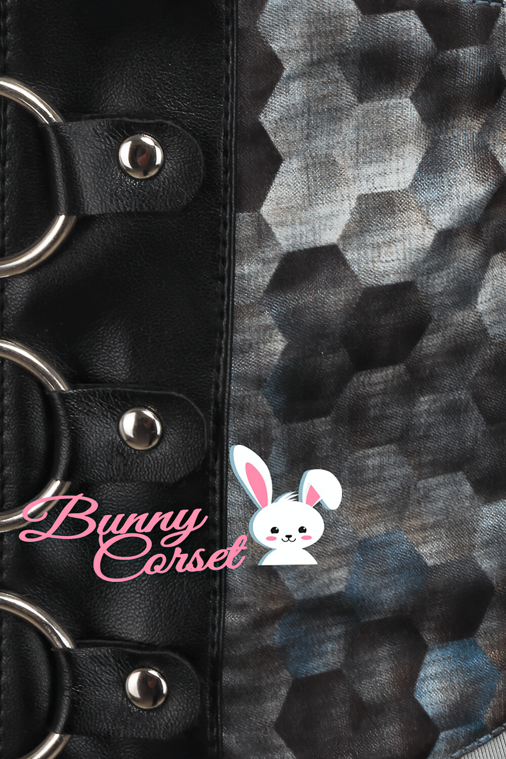 Close-up of a stylish Bunny Corset with hexagonal pattern and metal ring accents on a black background.