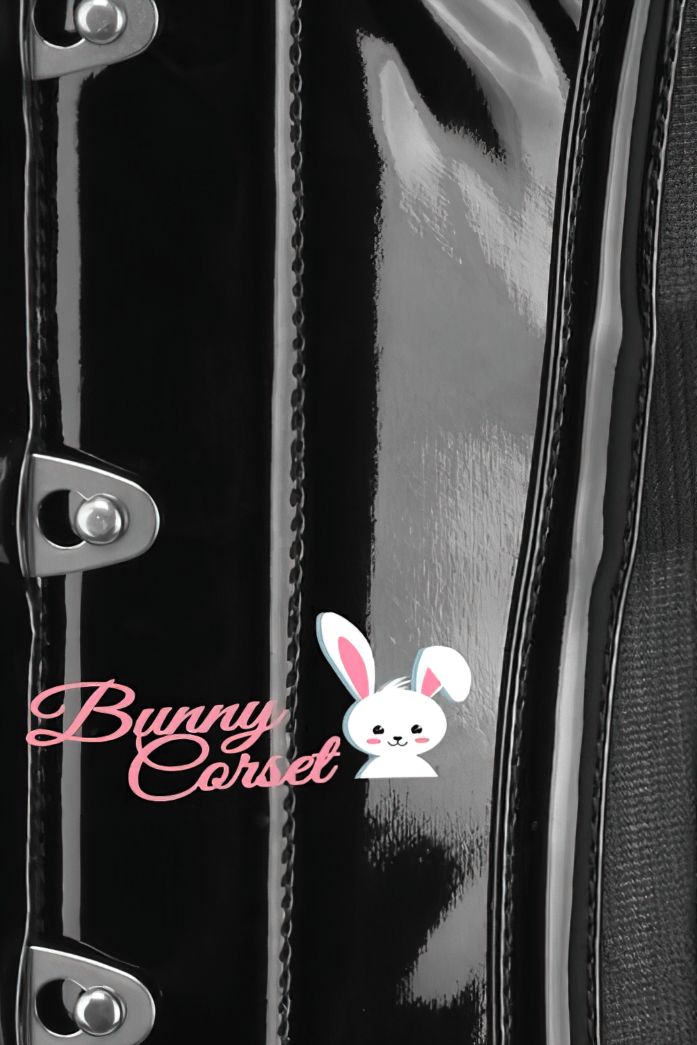 Close-up of a black PVC corset with metal busk and logo featuring a cute bunny design.