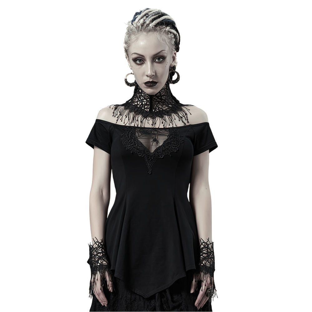 Stylish woman wearing a black off-shoulder t-shirt with spiderweb embroidery and gothic accessories.