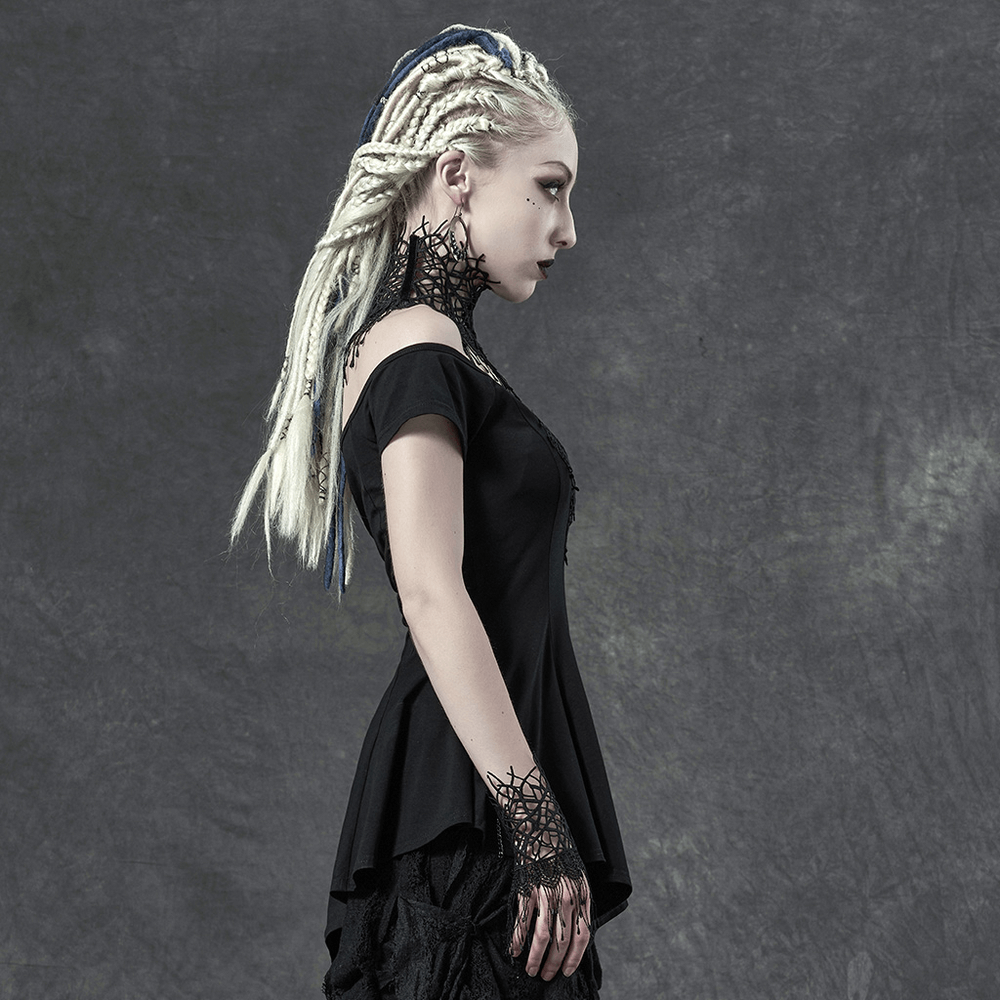 Model showcasing a waisted black off-shoulder t-shirt with spiderweb embroidery, perfect for a stylish and edgy look.