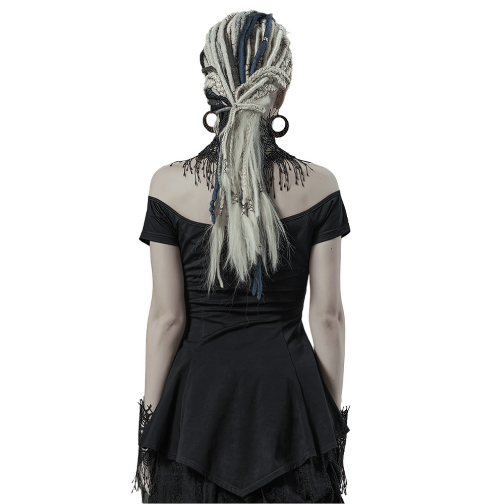 Back view of a woman in a black off-shoulder top with long, braided hair and gothic accessories.