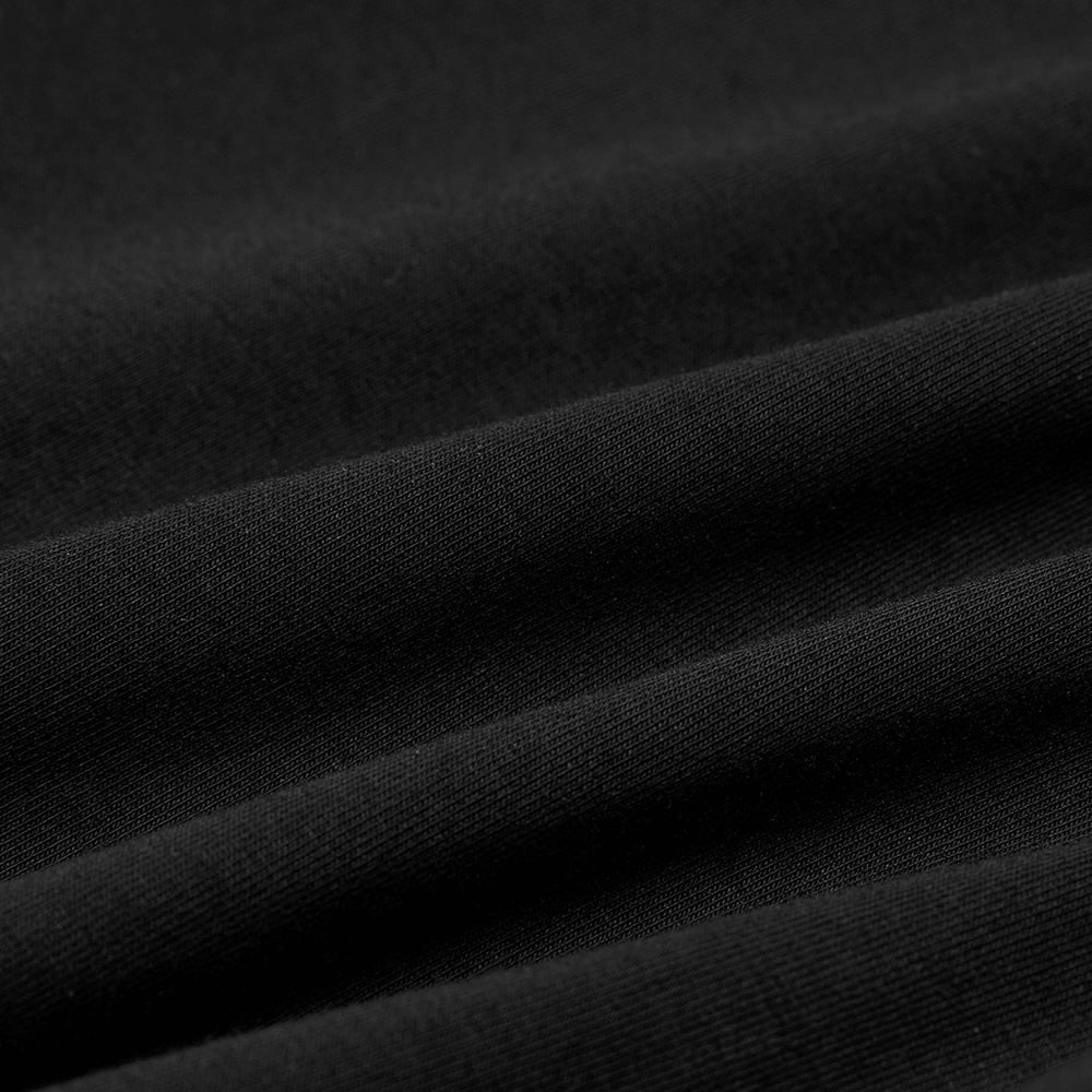 Close-up of soft black fabric showcasing smooth texture for stylish apparel.