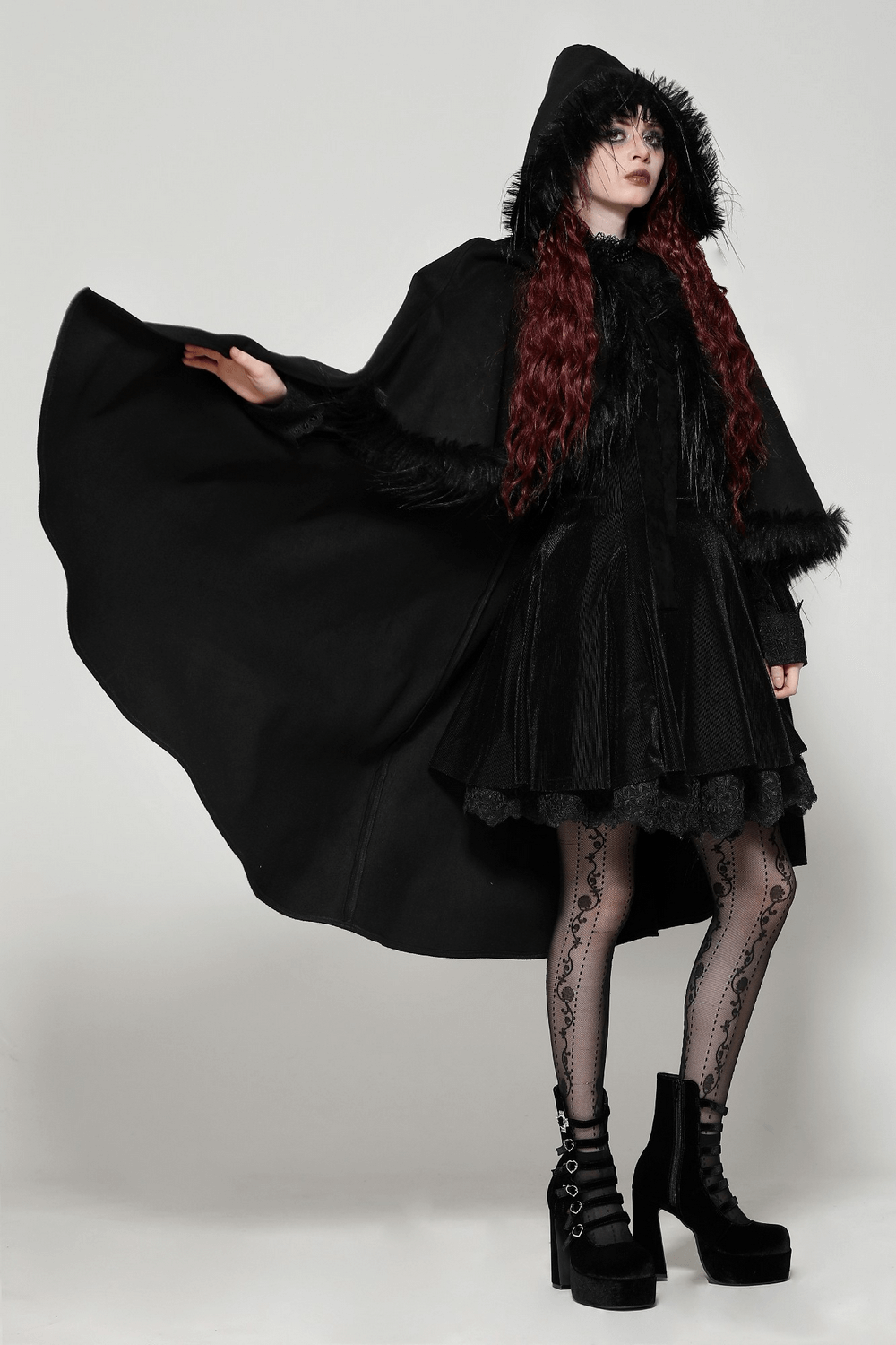 Elegant gothic hooded cape with faux fur trim, flowing design, perfect for bold festival outfits.