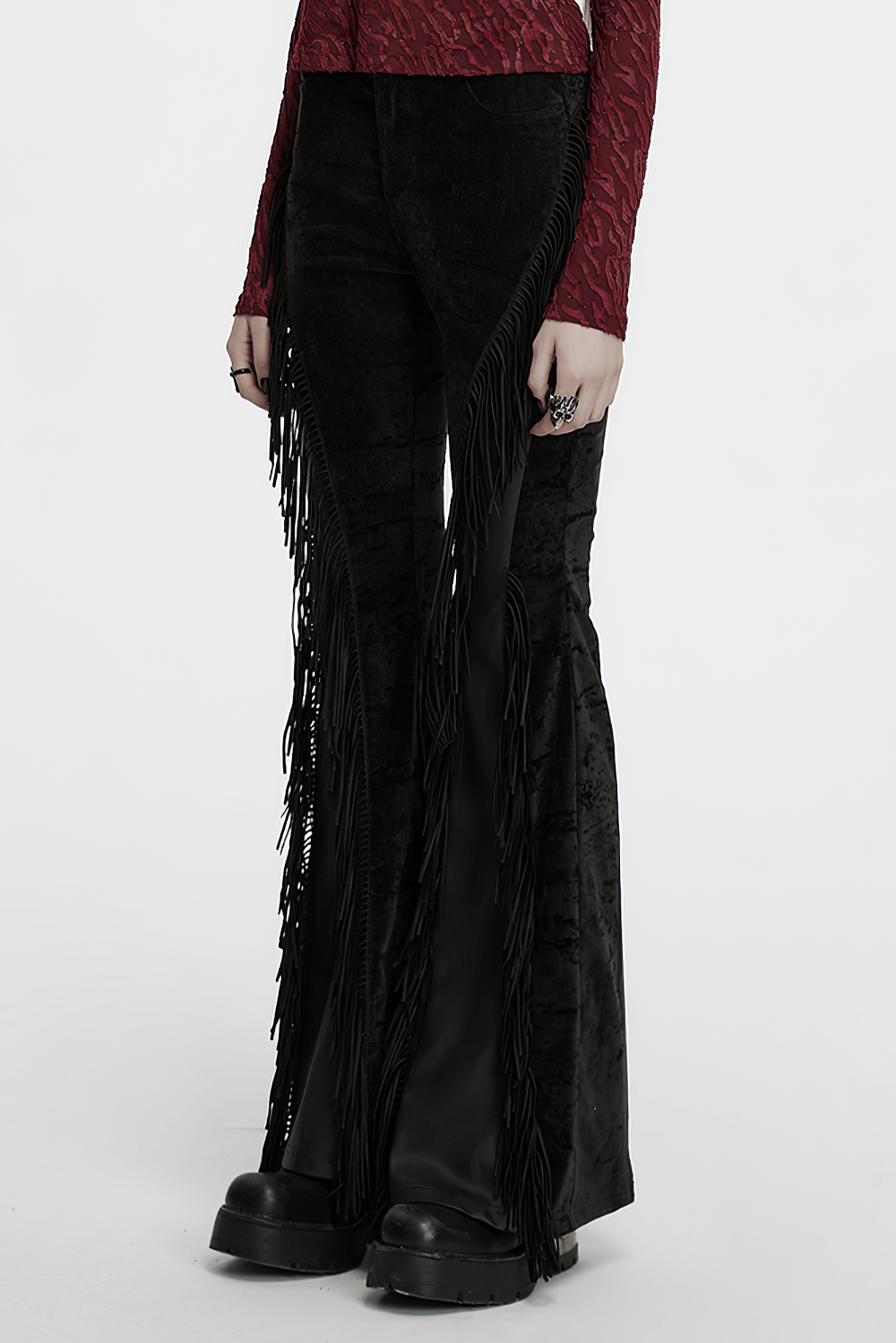 Wasteland black tassel flare pants with velvet detailing, featuring unique fringe and flared design for a gothic look.