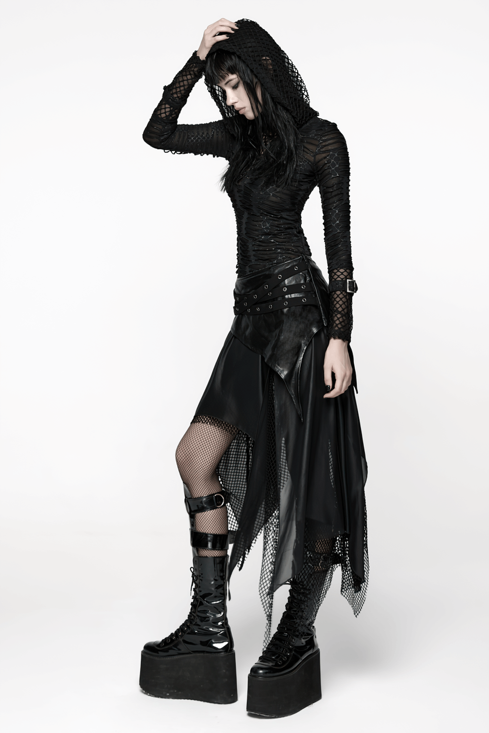 Wasteland Punk Skirt with Mesh and Faux Leather Design worn by model, featuring a rebellious layered look.