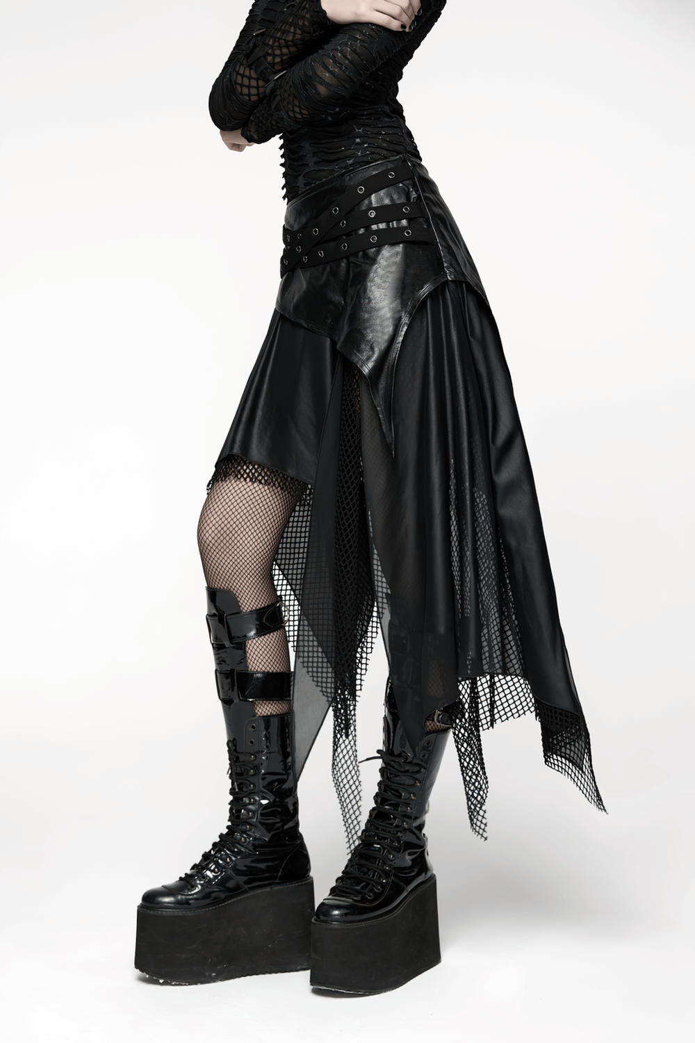 Wasteland Punk Skirt with Mesh and Faux Leather Design featuring eyelet belt detail and irregularly tailored style.