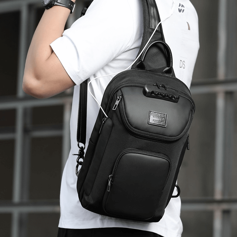 Stylish men's waterproof shoulder bag on a person, showcasing a sleek design and multifunctional capacity.