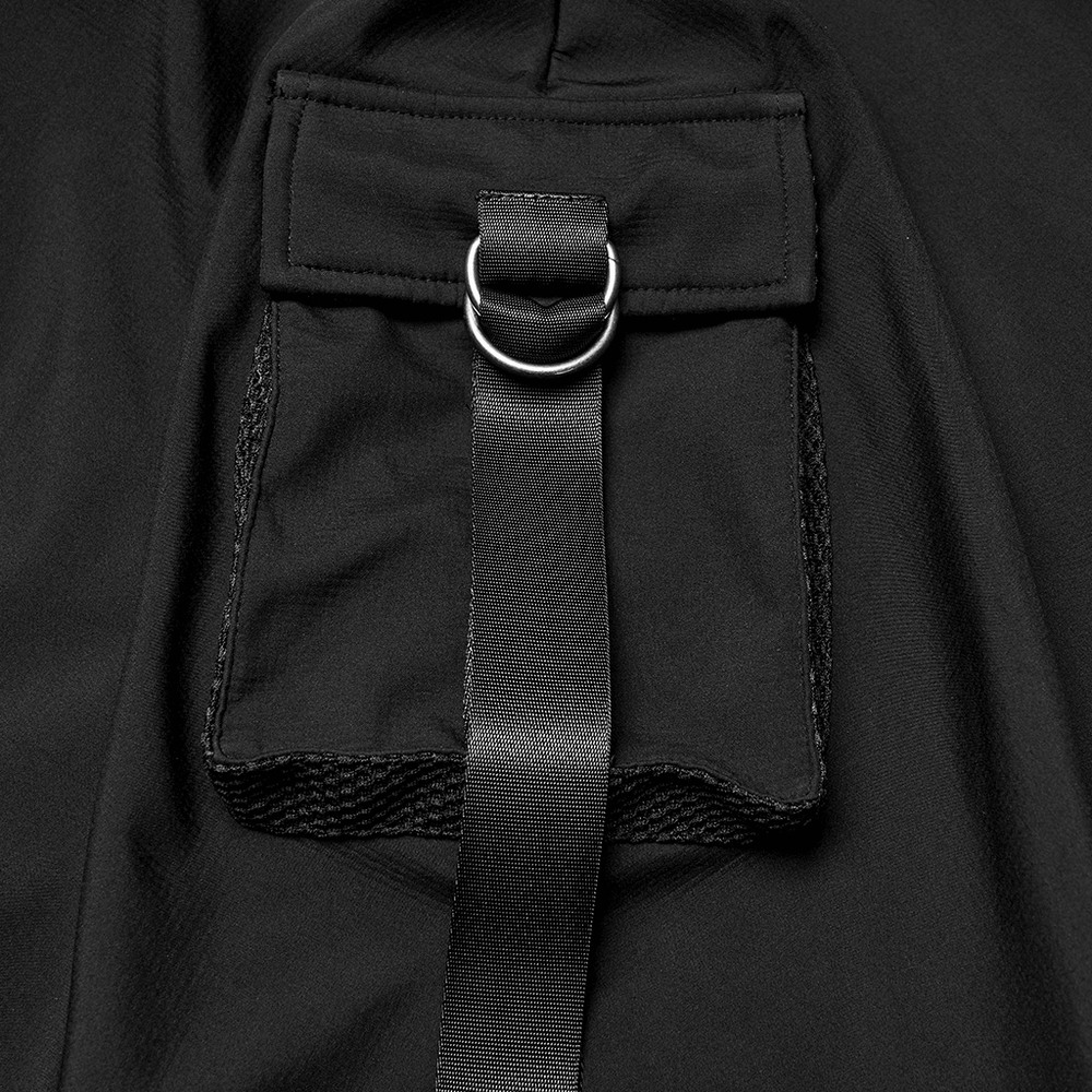 Detail of the Waterproof Wasteland Punk Cape with Hood and 3D Pockets featuring patch pocket and ring design.