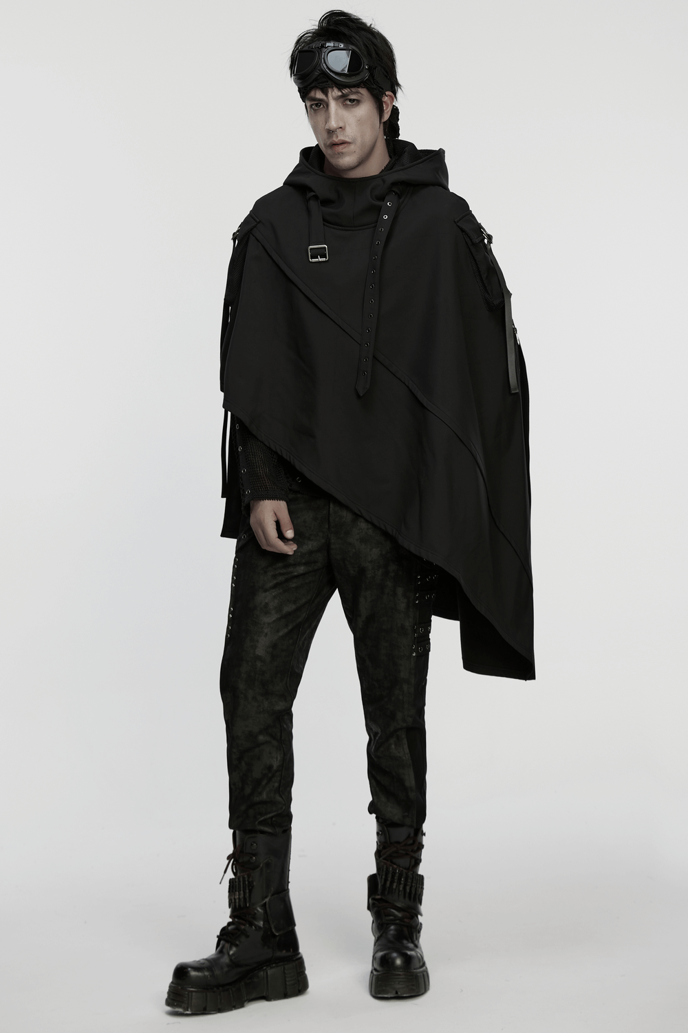 Waterproof Wasteland Punk Cape with Hood and 3D Pockets worn by a model in a stylish urban setting.
