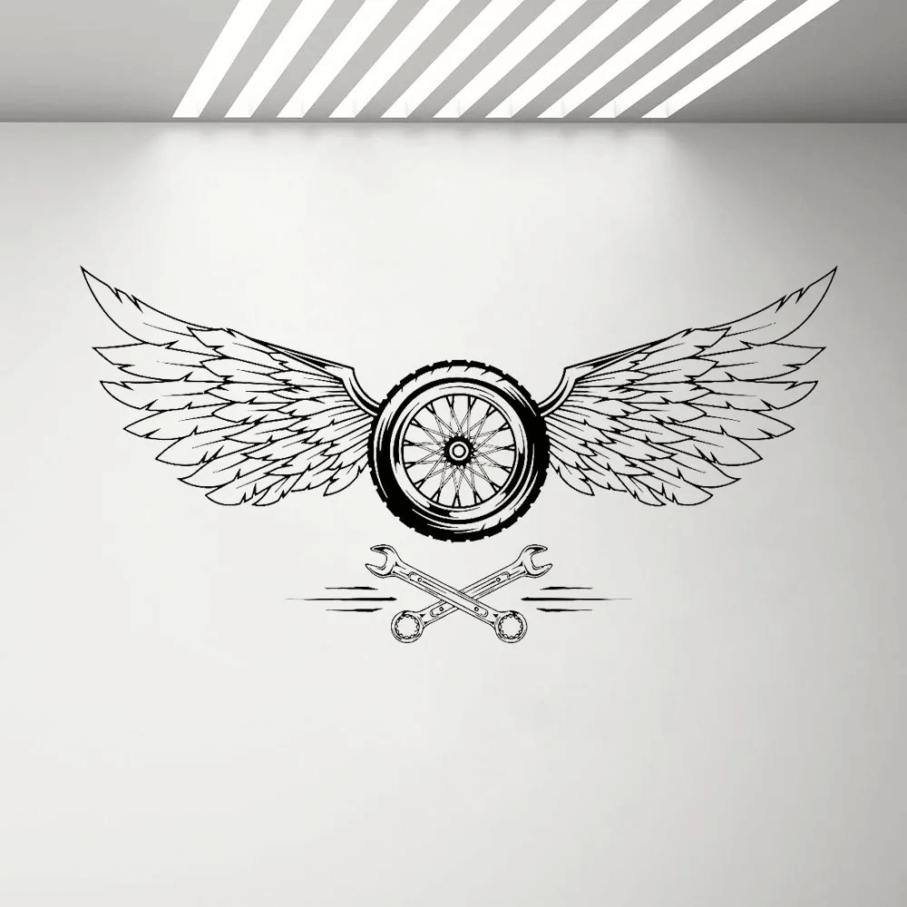Wheel Wings Vinyl Decal for Car Garage Wall Decor featuring a bold wheel and wing design with crossed tools.