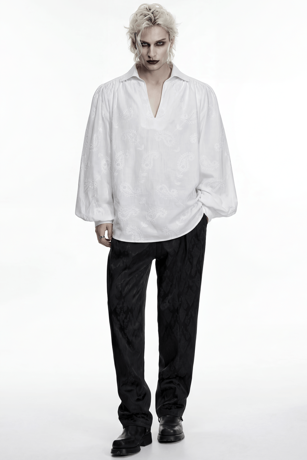 White Gothic Embroidered Loose Shirt with Puff Sleeves styled with black trousers and gothic accessories.