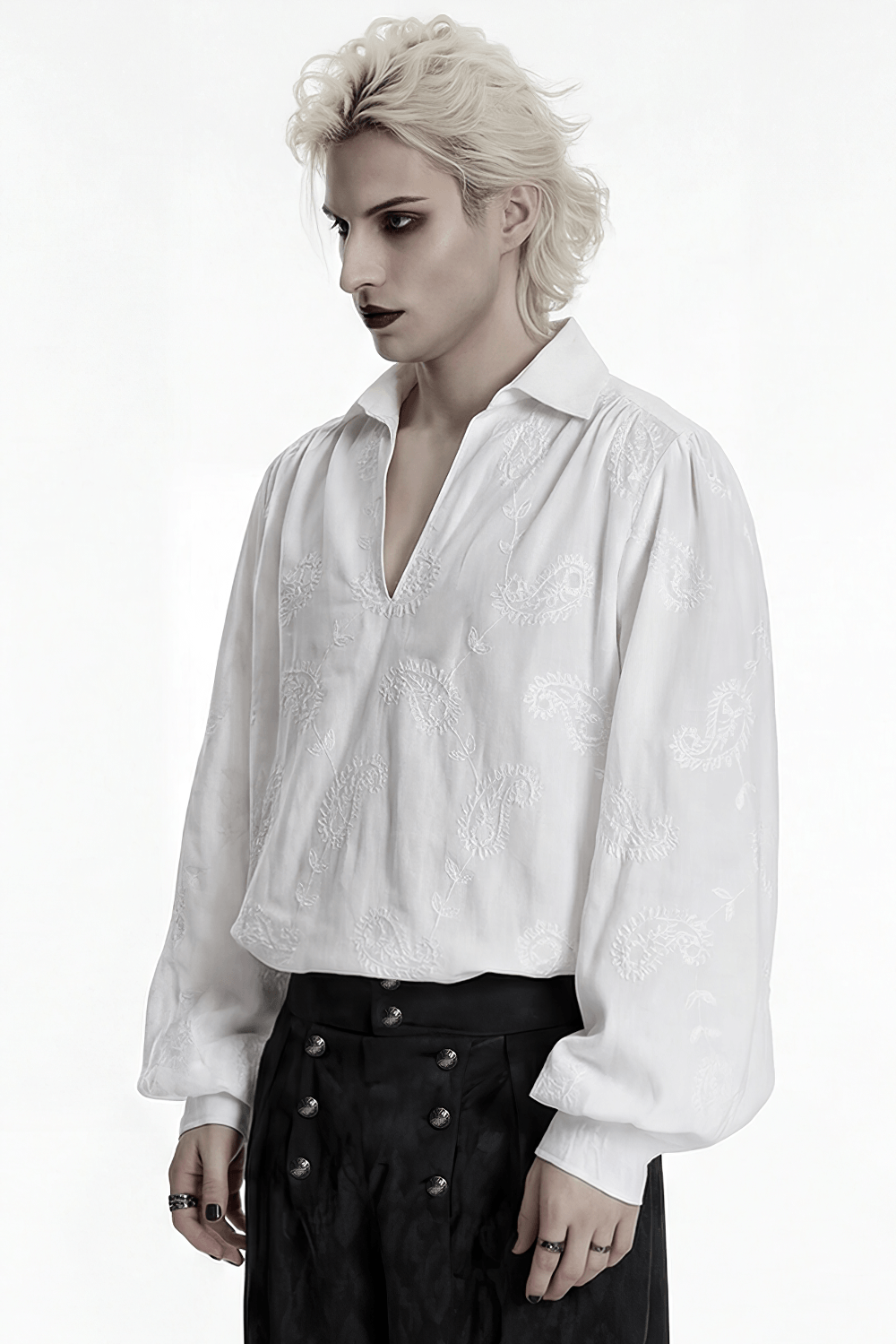 White Gothic Embroidered Loose Shirt with Puff Sleeves modeled by a person with a court collar and V-neck.