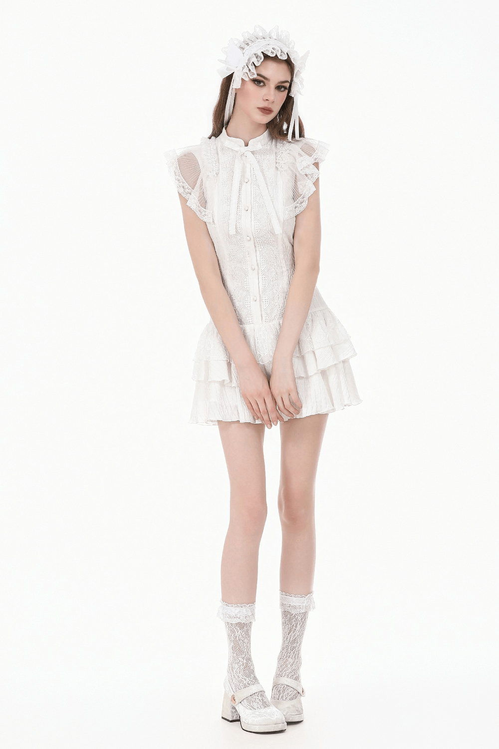 White Gothic Lolita Lace Dress with Ruffle Skirt modeled by a woman in a striking pose.