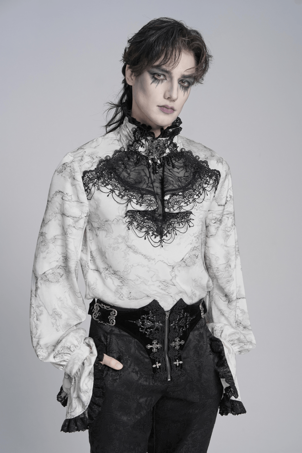 White Gothic Marble Shirt with Lace Ruffle Bib model showcasing dramatic flared cuffs and high neck collar.