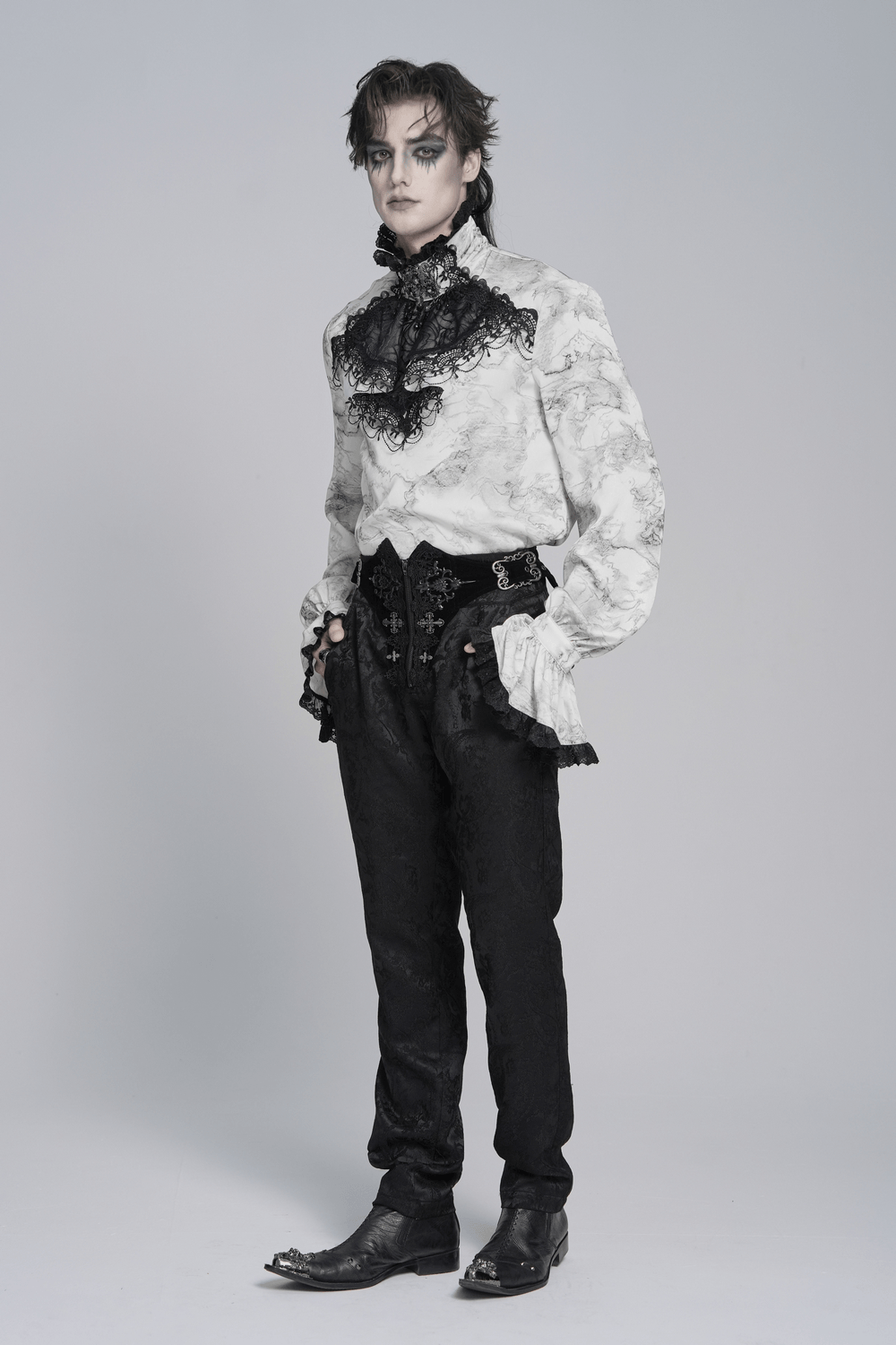 White Gothic Marble Shirt with Lace Ruffle Bib worn with gothic trousers, showcasing a dramatic high neck and ornate black lace details.