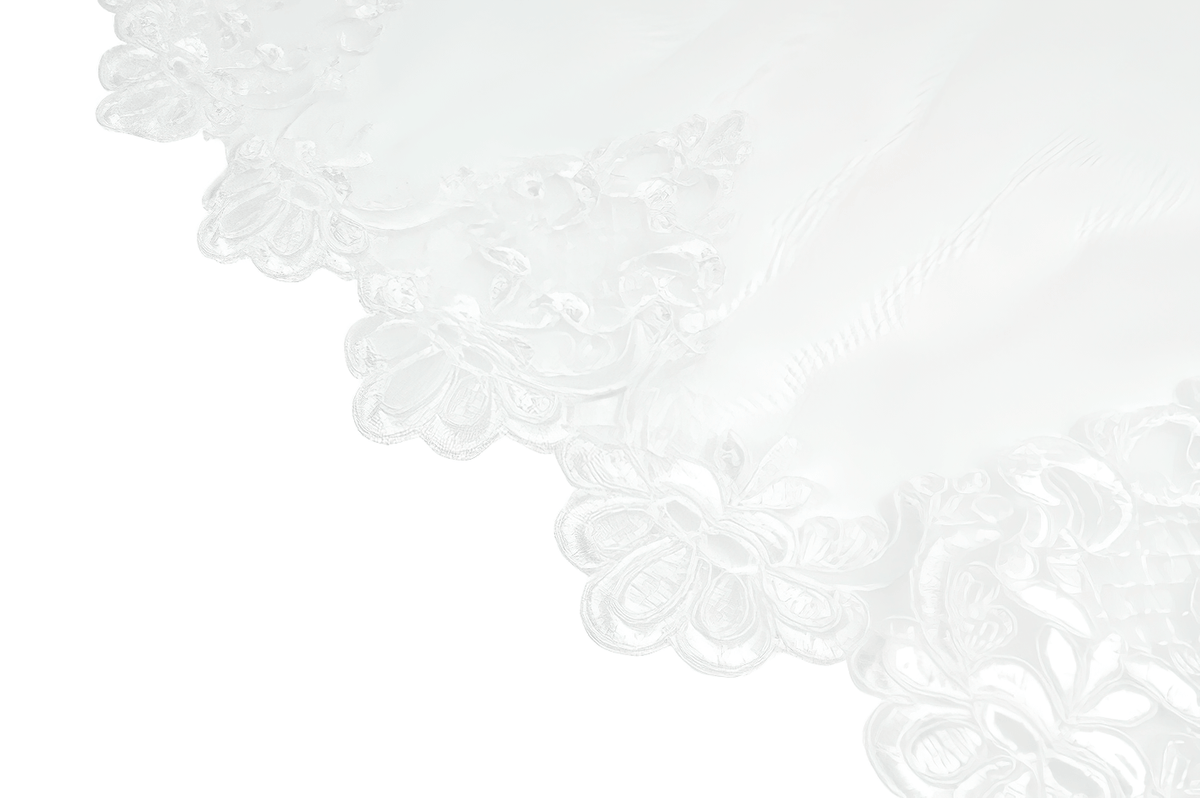 Delicate floral lace trim of the White Gothic Tulle Skirt with Embroidered Lace Hem adding romantic detail.