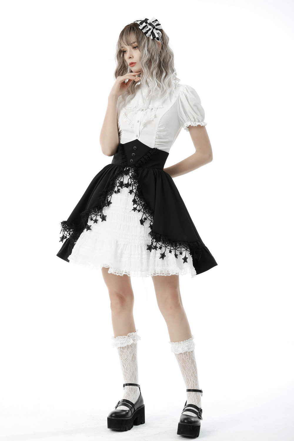 Victorian-inspired outfit featuring a white blouse and black skirt with lace details, perfect for elegant occasions.