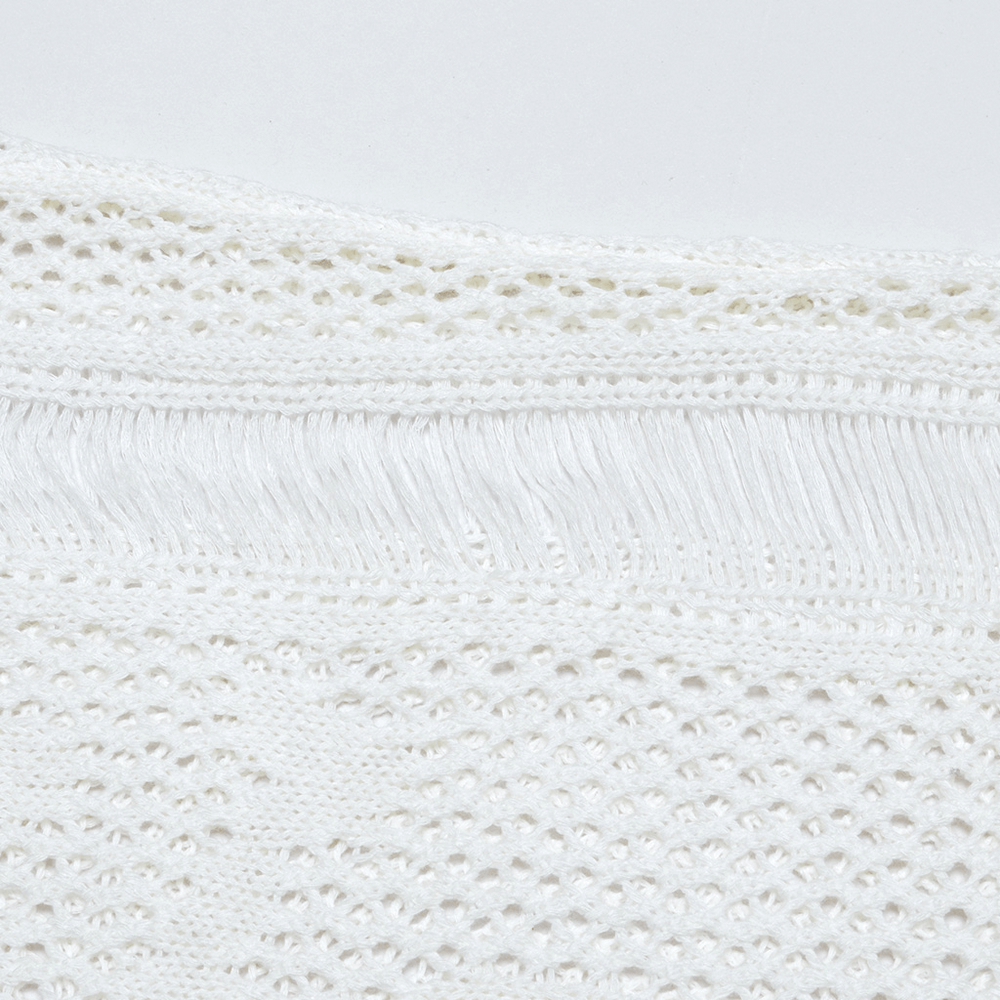 Close-up of white mesh knit fabric showcasing intricate crochet detail and soft yarn texture. Perfect for punk-inspired designs.