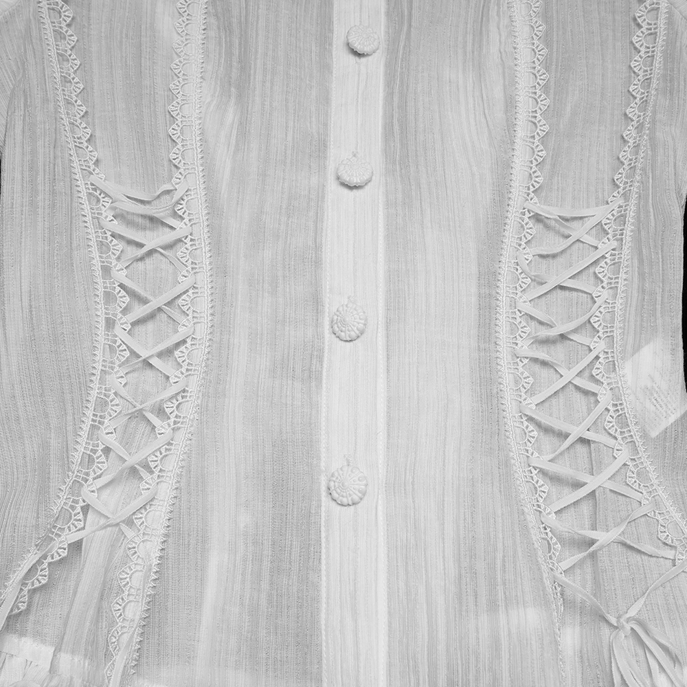 White Retro Lace-up Corset Blouse with Puff Sleeves featuring intricate lace-up detailing and textured fabric.
