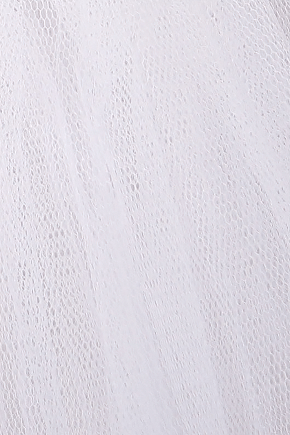 Close-up of soft white tulle fabric, perfect for gothic, punk or kawaii layered skirts.