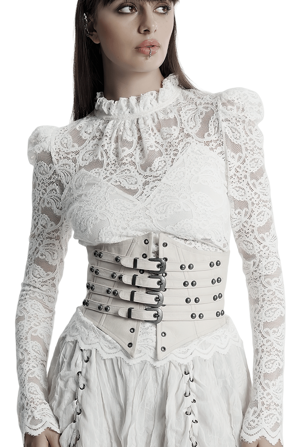 White underbust corset with buckles and studded accents, paired with lace blouse for a punk retro look.