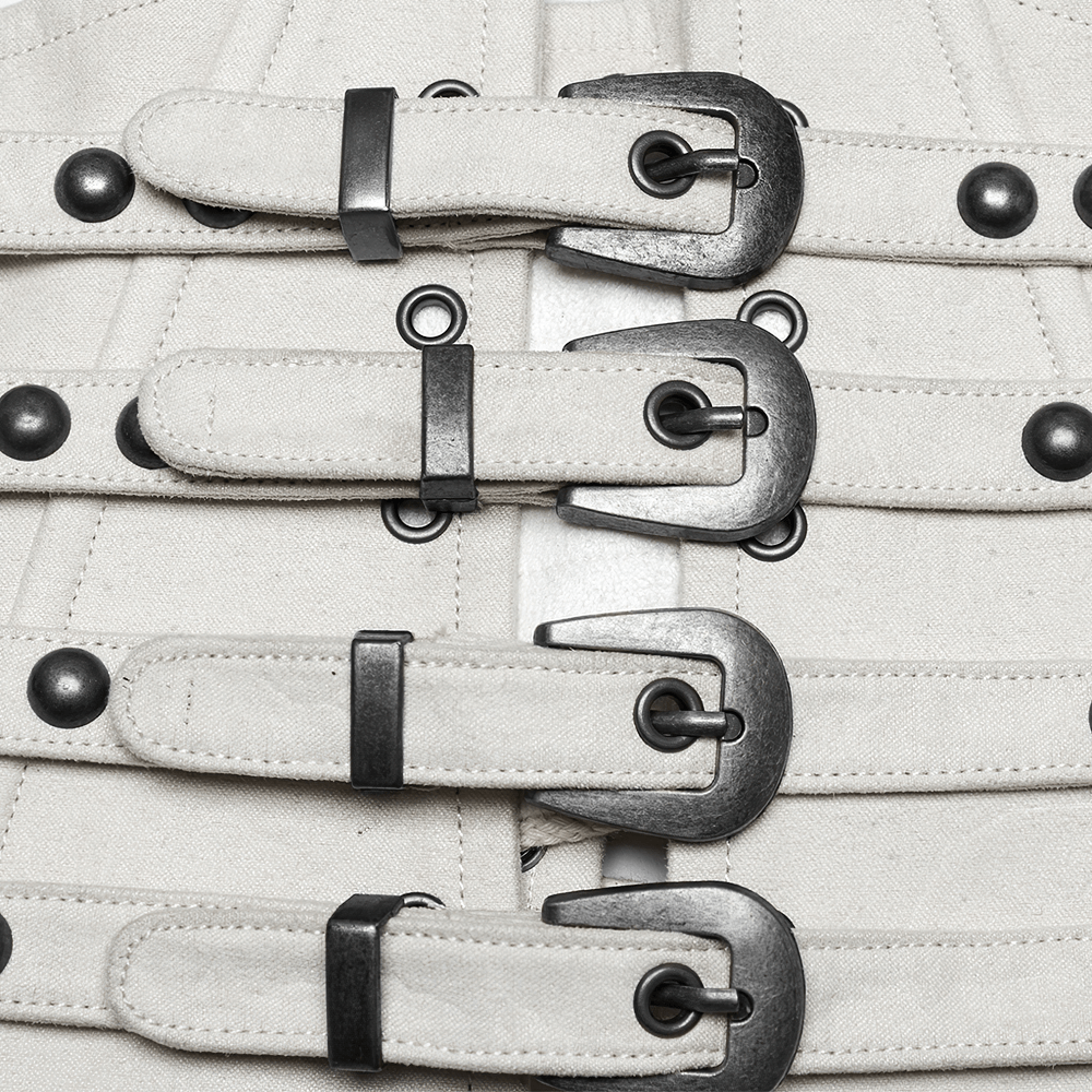 Close-up of white underbust corset with adjustable buckles and metal accents for a punk style.