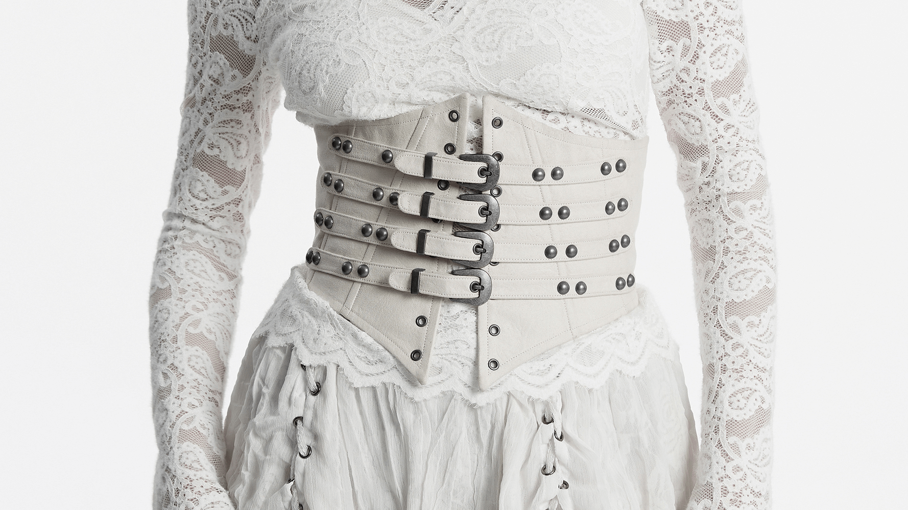 White underbust corset with buckles, studs, and adjustable straps for a punk retro style.